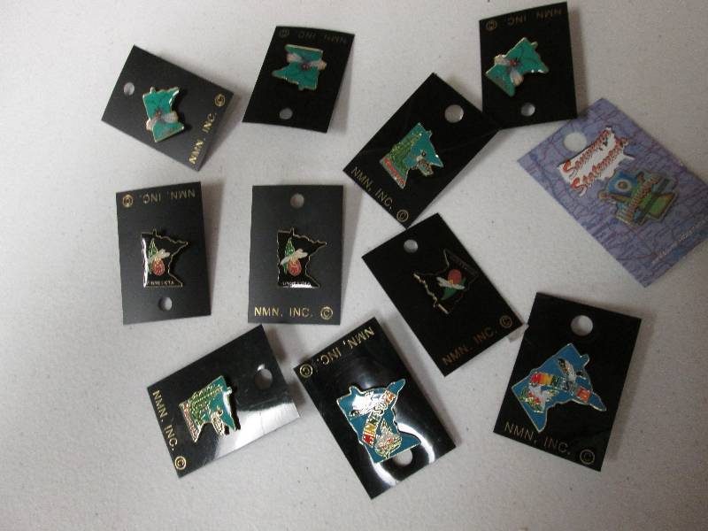 Lot of 11 assorted Minnesota pins...