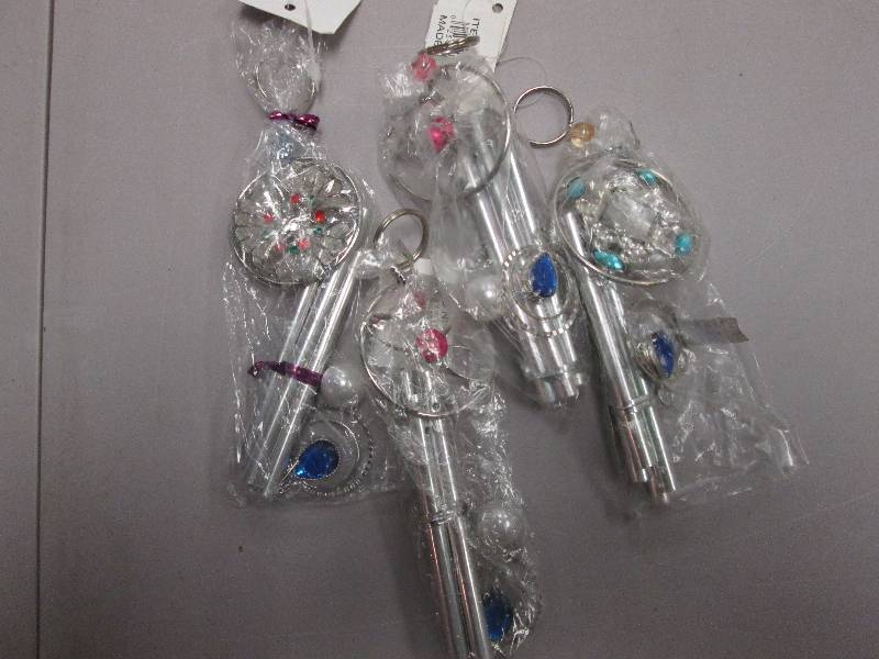 Lot of 4 mini assorted windchimes...