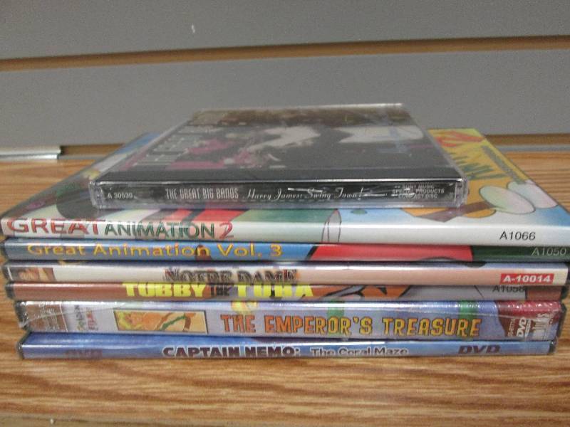 6 kid DVDs, 1 music CD...