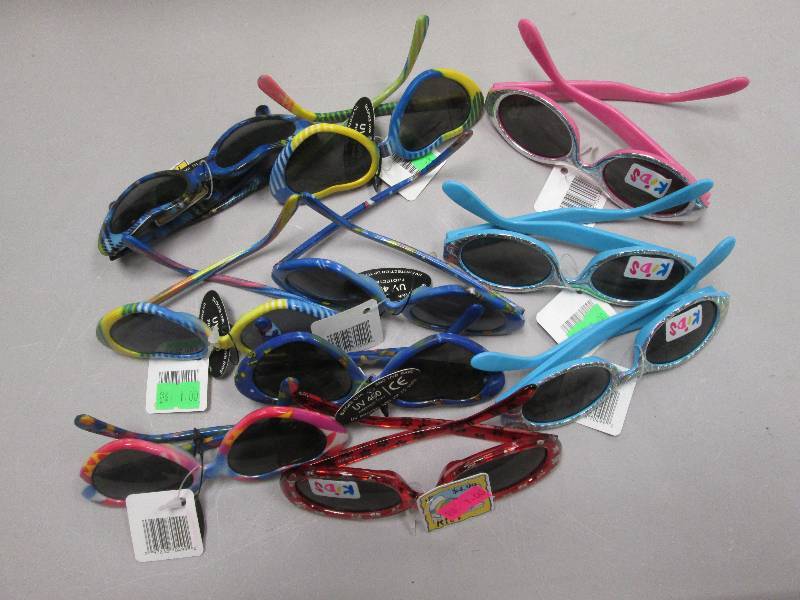 Lot of 10 kids sun glasses...