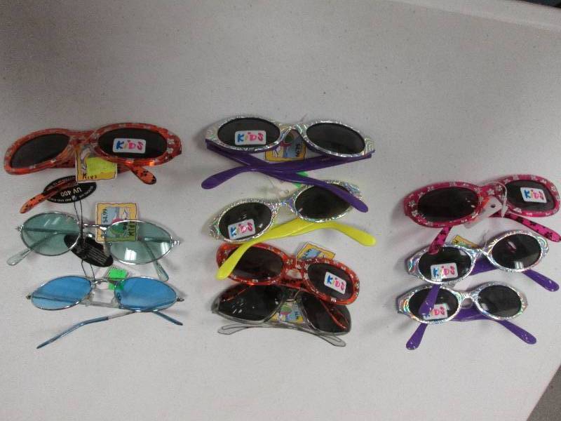 Lot of 10 kids sun glasses...