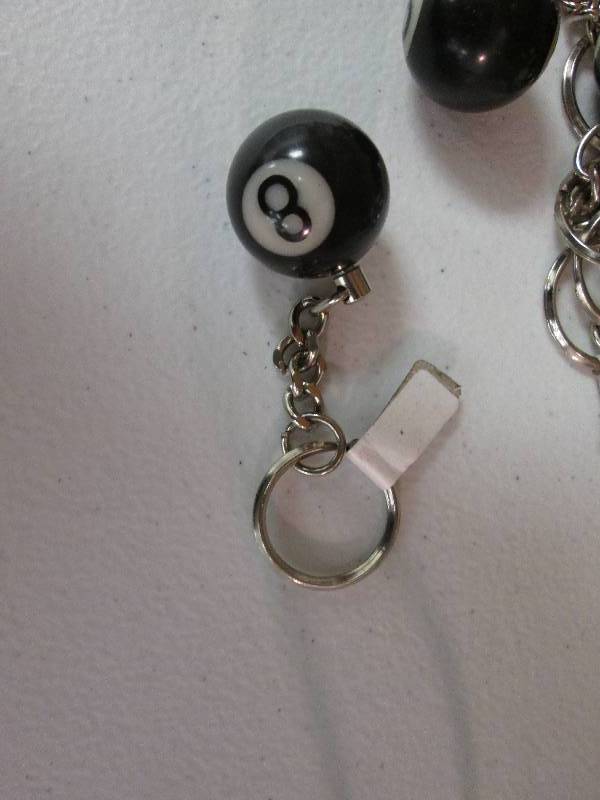 Lot of 10 8 ball keychains  ...