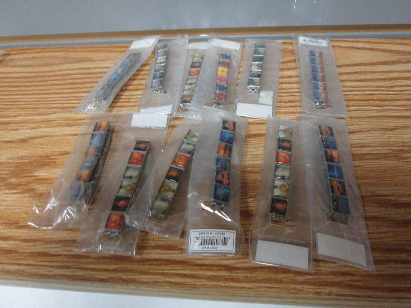 Lot of 12 elastic metal tile bracel...
