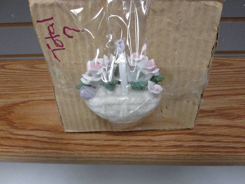 Lot of 7 ceramic flower baskets...