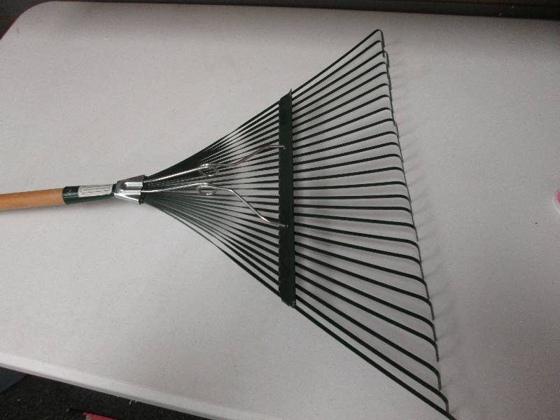 Metal leaf rake with cushioned hand...