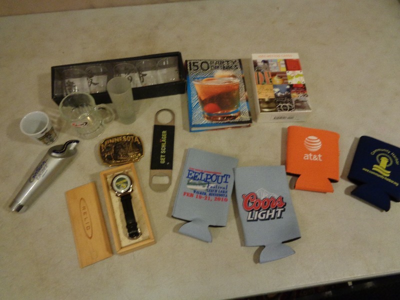 lot 58 image: Beer Tap Handle, Packers Watch, Belt Buckle, Shot Glasses