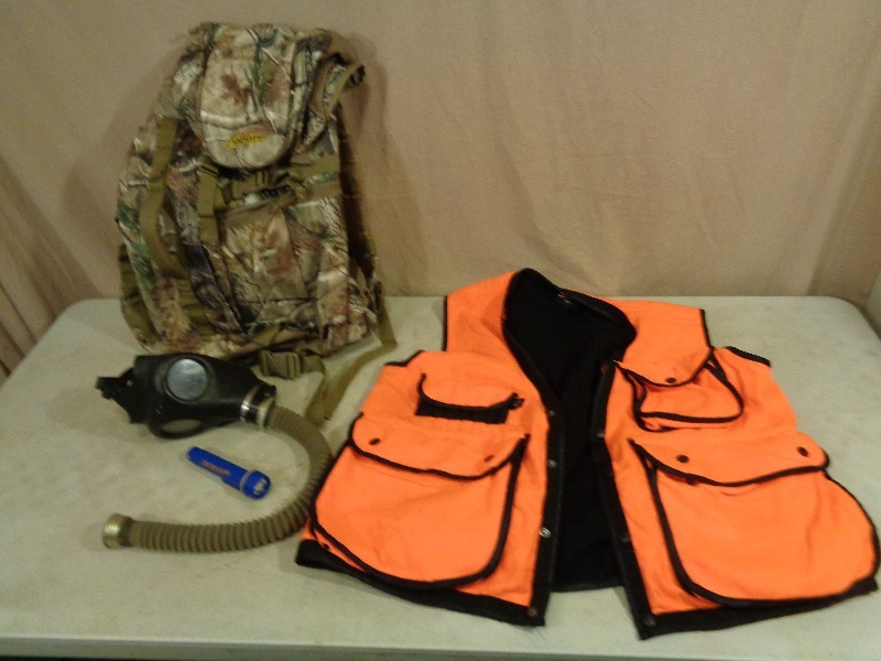 lot 118 image: Fieldline Bag, Gas Mask, and Guide Series Hunting Vest