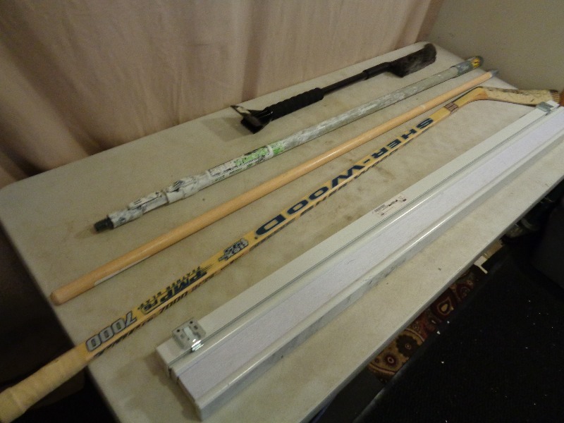 lot 197 image: Hockey Stick, Broom Handle, and More