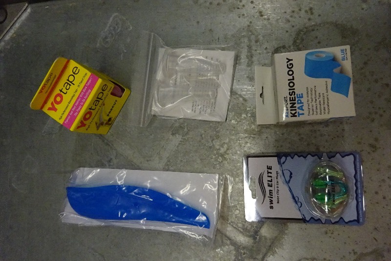 lot 70 image: Swim items, tape, massage cups, womens pee cup