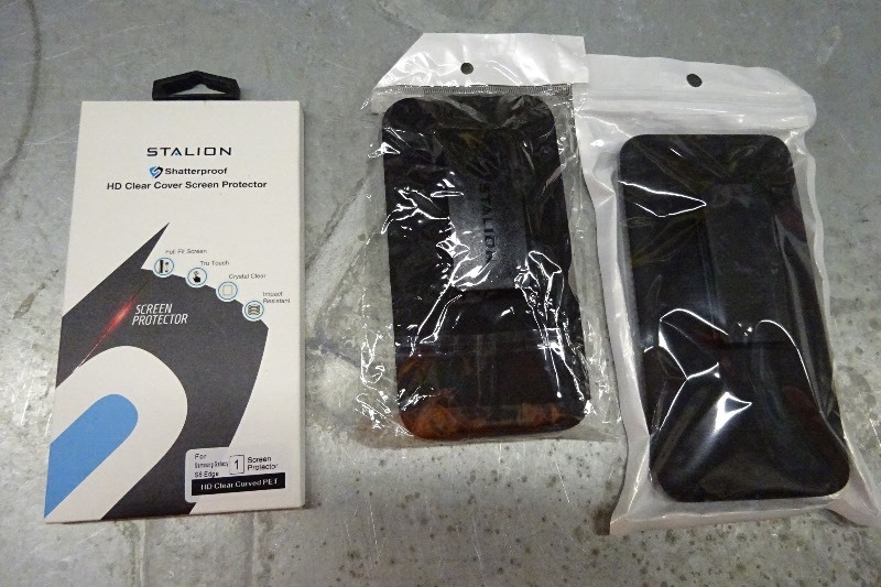lot 103 image: Galaxy S6 edge cases (2) and screen protector