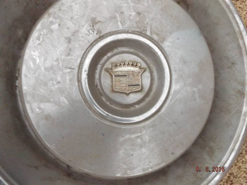 lot 17 image: 2 Misc Hubcaps