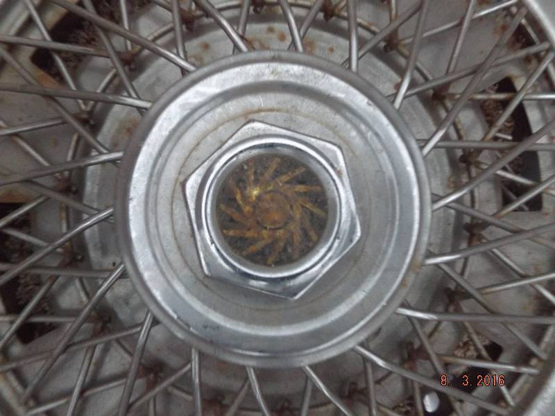 lot 21 image: 2 Misc Hubcaps