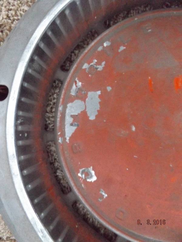 lot 23 image: 2 Misc Hubcaps
