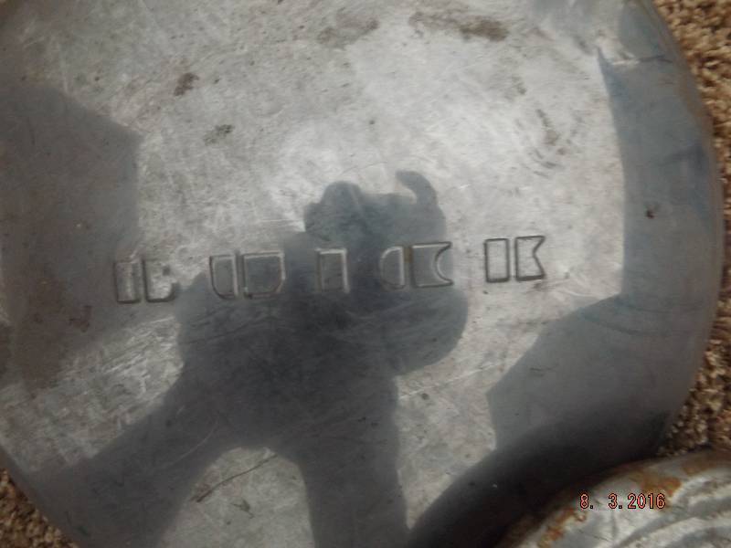 lot 26 image: 2 Misc Hubcaps
