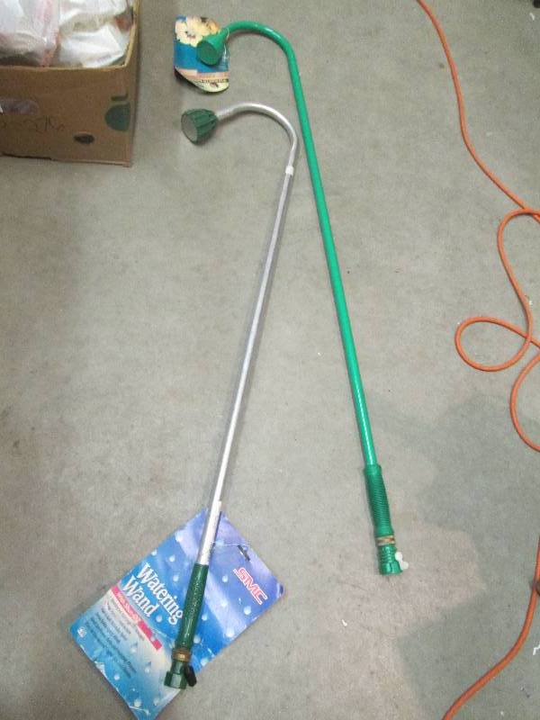 2 long water sprayers new ...