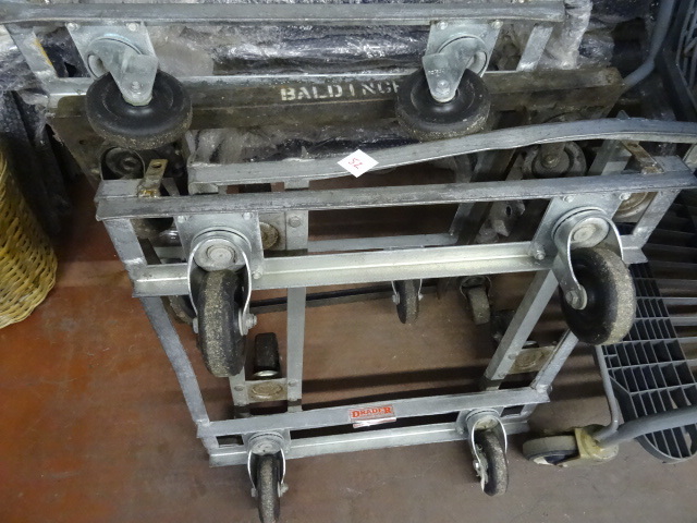 lot 52 image: 4 Metal 4 Wheel Dollies