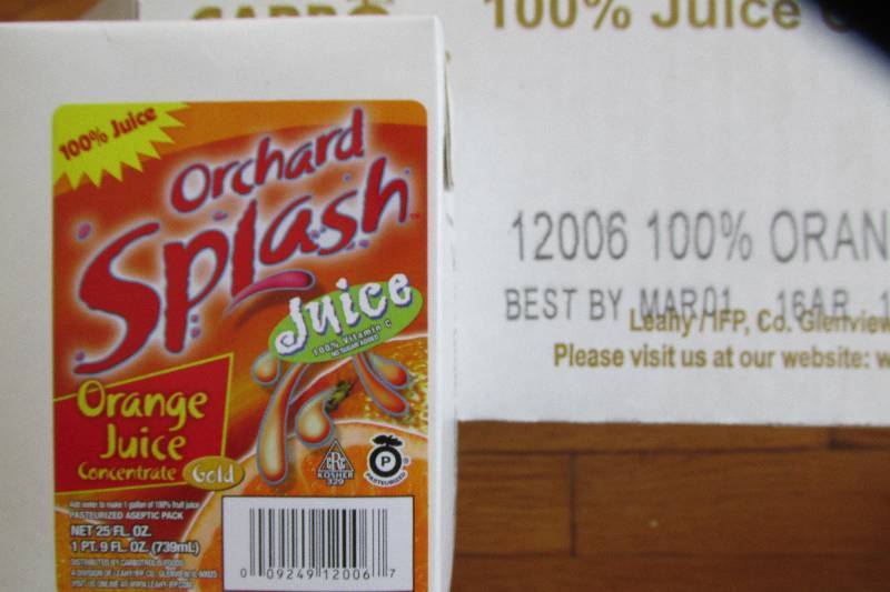 12 cartons of Orchard Splash orange...