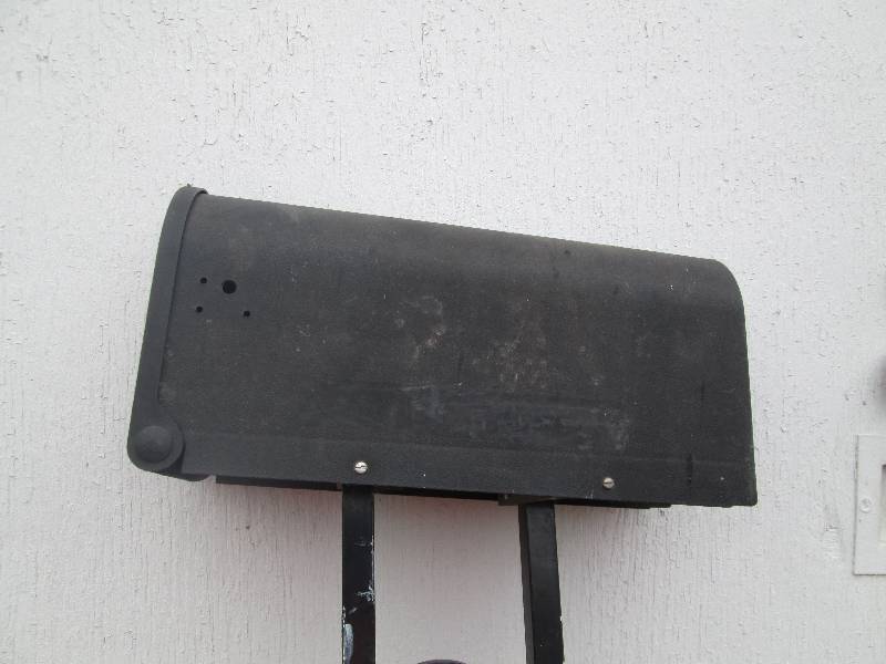 US mail box with metal decorated st...
