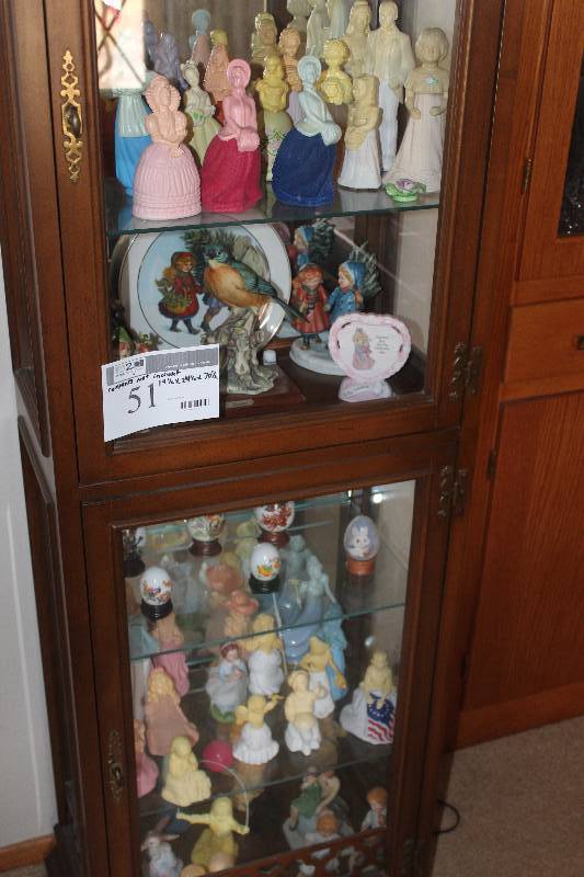 Contents of Cabinet Including Figurines