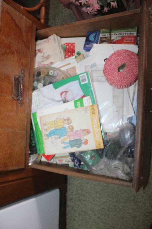 Contents of 4 Drawers Including Household Items