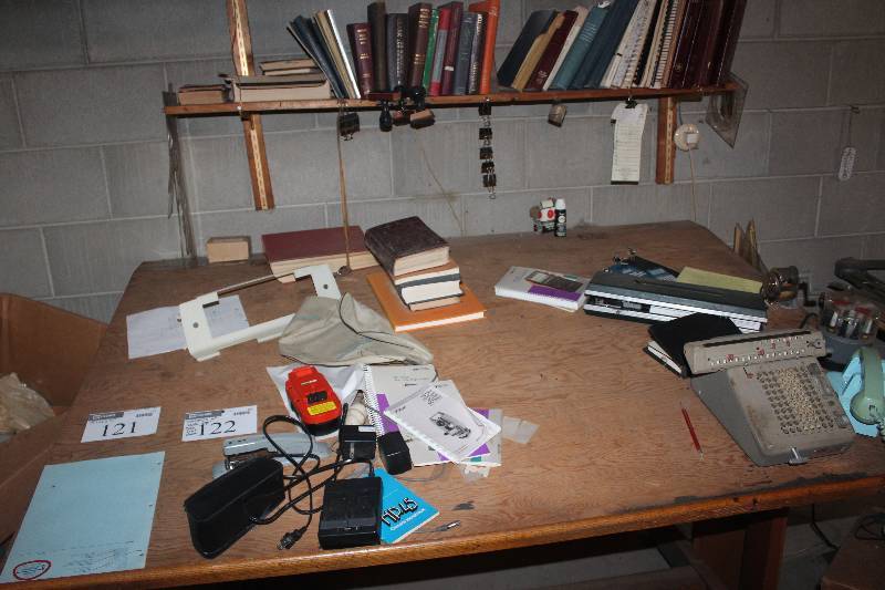 Contents of Desk Top and Book Shelf Above