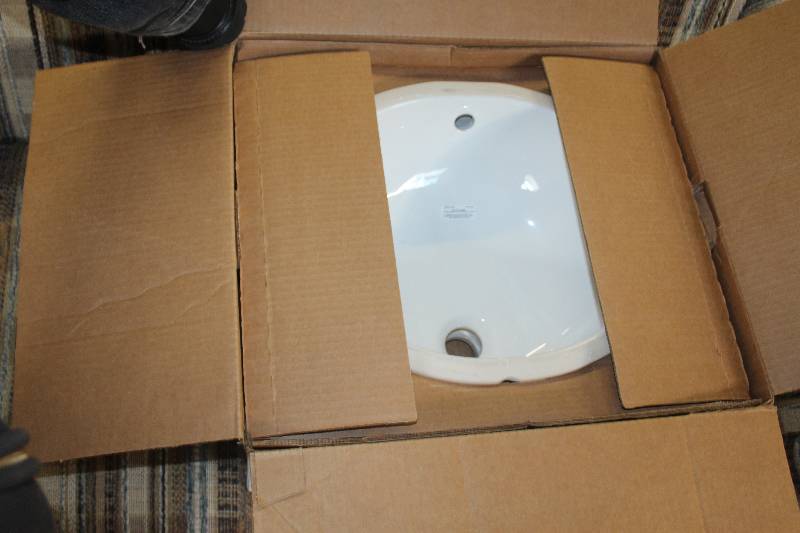 lot 216 image: Kohler Undercounter Lavatory