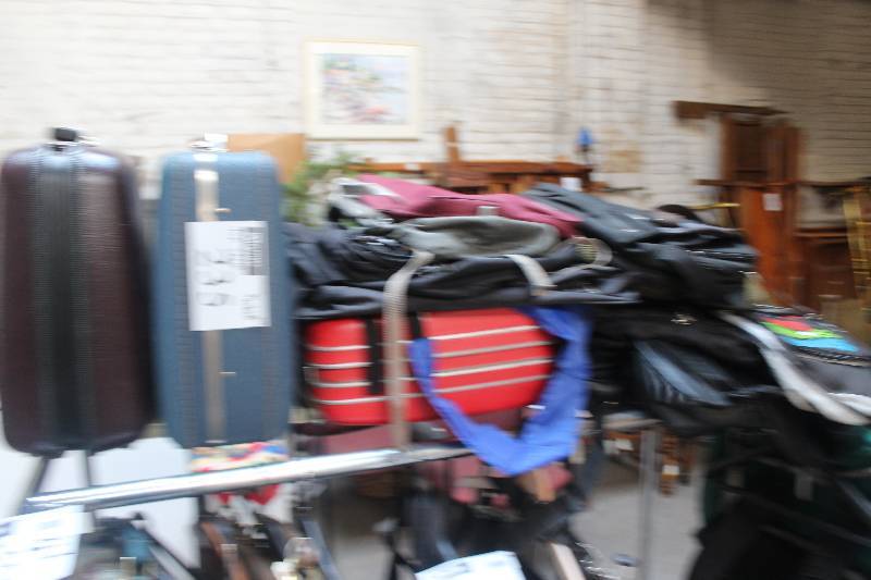 lot 235 image: Top Shelf Lot of Luggage