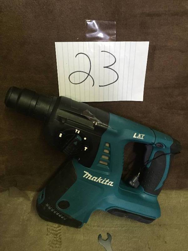 lot 23 image: Makita HRH01 - Cordless Rotary Hammer Drill Kit- Tool Only- requires 1 36V Battery in like new condition