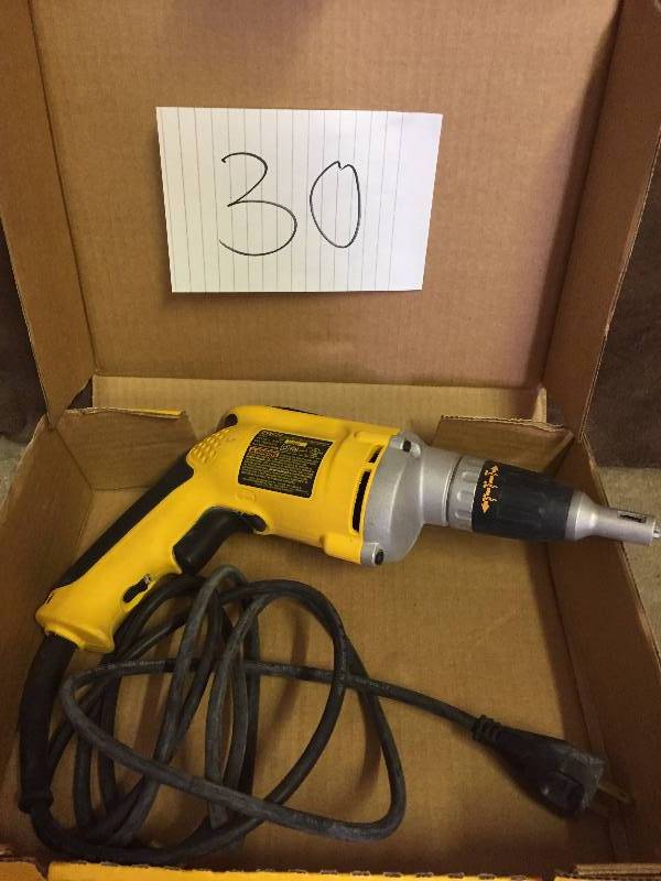 lot 30 image: Dewalt 4000 RPM Variable Speed Reversible Drywall Scrugunused  in good  condition