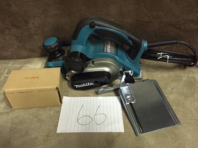 lot 66 image: Makita 3-14 in. Corded Planer New