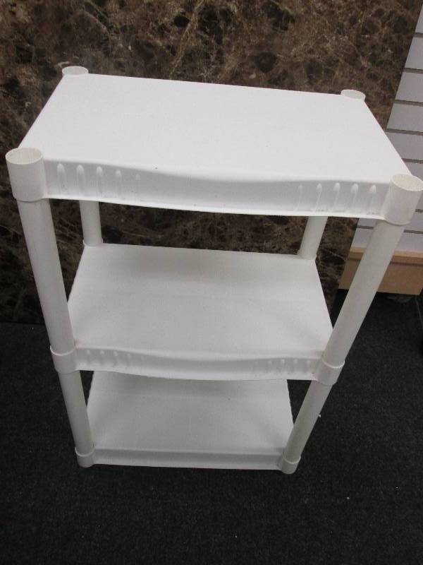 white plastic 3 shelf measures 21 x...