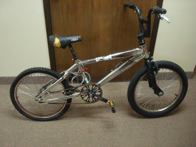 lot 17 image: Boys Chrome BMX Bike, Used, Shows Wear, Needs Maintenance, Needs New Seat