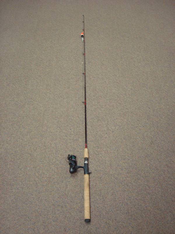 lot 24 image: Berkley Fish Pole With A Mitchell Reel