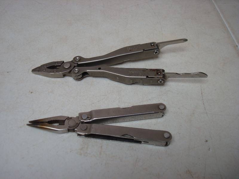 lot 37 image: Pair Of Utility Tools, Leatherman Has Tiny Broke Tip