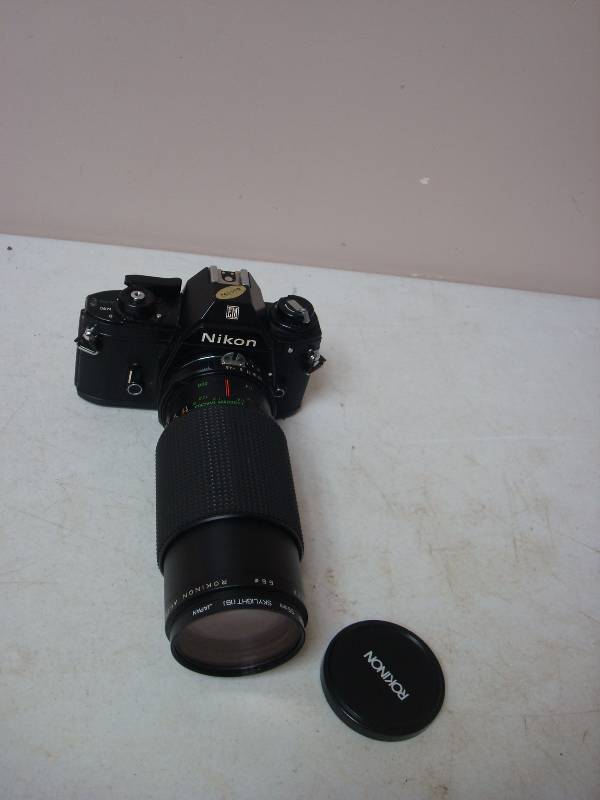 lot 52 image: Nikon Film Camera With Long Lens, UNTESTED