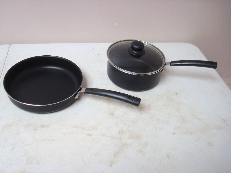lot 65 image: Pair Of New Pans, One Cover Is Used