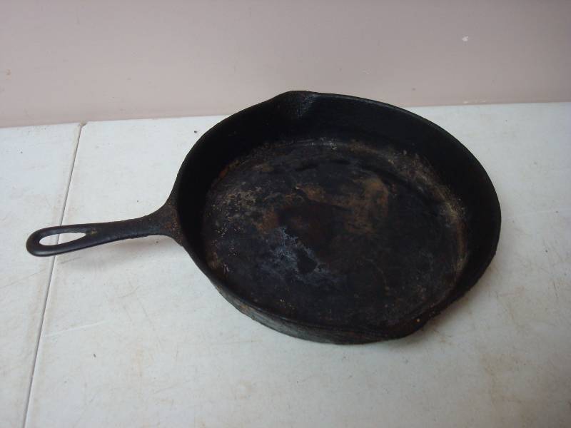 lot 71 image: Large Cast Iron Pan, Shows Wear