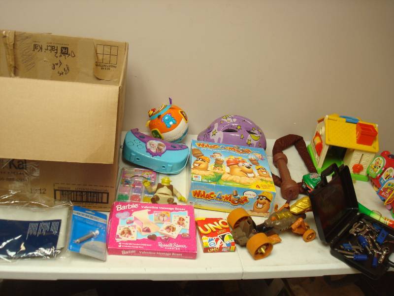 lot 82 image: Box Filled With Mixed Items, Toys, Kids Tools, Barbie Cards