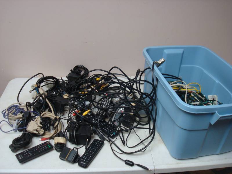 lot 123 image: Bin Filled With Wires And Remotes