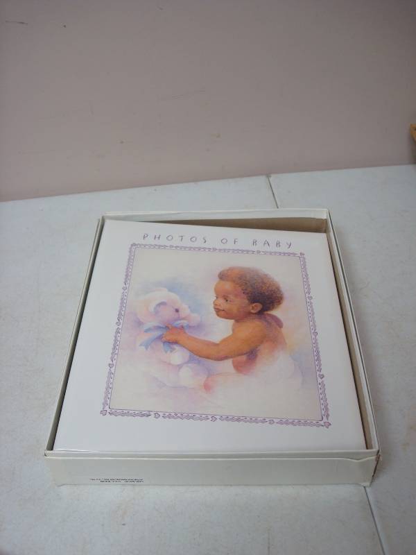 lot 128 image: African Hallmark Baby Book