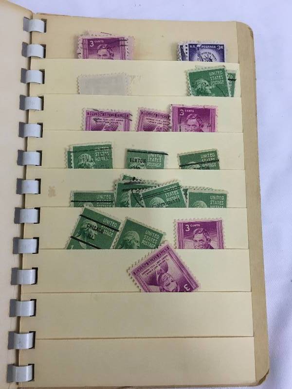 Pocket stock book full of new and used stamps