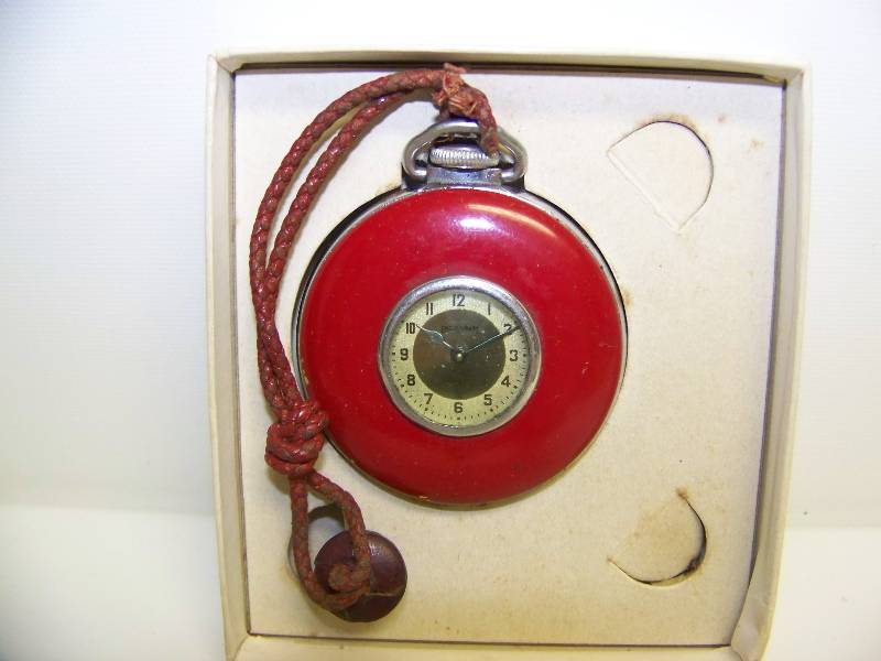 lot 10 image: Aristocrat (Ingraham) Clock Company, Lapel Watch in Original Box