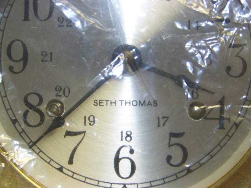 lot 8 image: Seth Thomas, Corsair, Ships Bell Clock with Key in Original Box