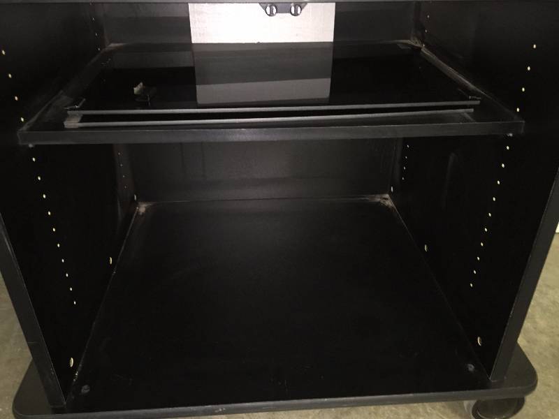 lot 10 image: TV STAND ON WHEELS WITH GLASS DOORS