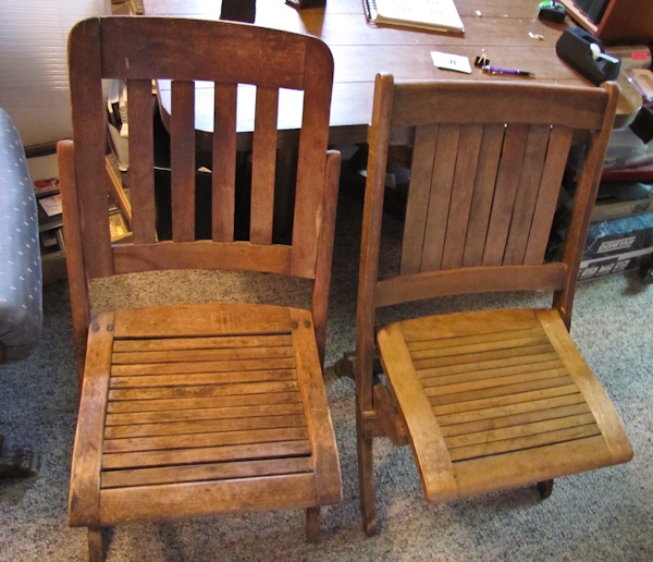 Two vintage solid wood folding chairs