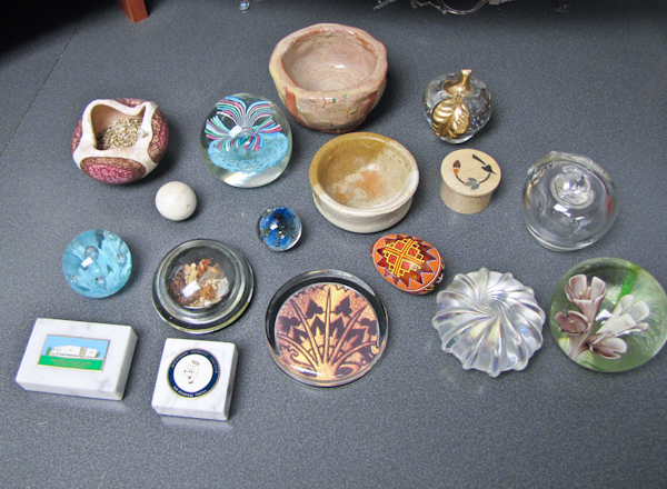 assorted paperweights and other desktop dcor items