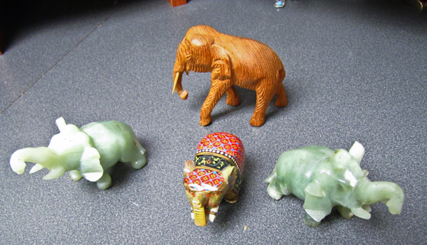 4 Thai style elephant figurines