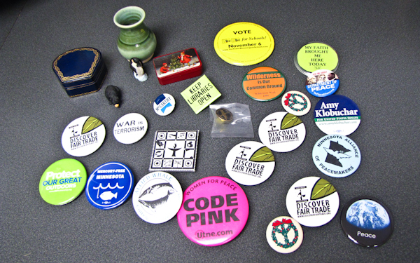 several pinback items and other small collectibles