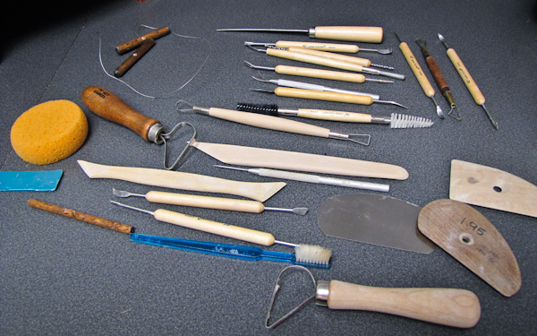 lot of artistic tools for pottery