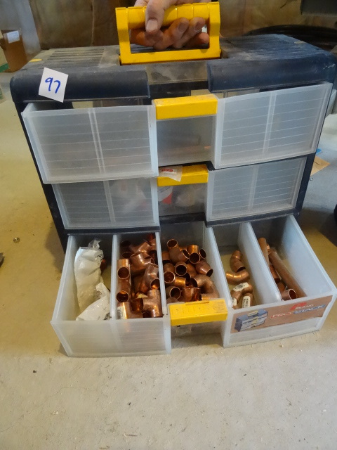 Bin full of 12 copper plumbing fittings